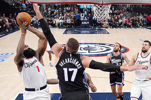 Kings vs Clippers NBA Basketball: Los Angeles Clippers guard James Harden, left, shoots 
