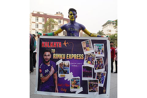 A Rinku Singh fan at Kolkata Knight Riders' IPL trophy in Durgapur
