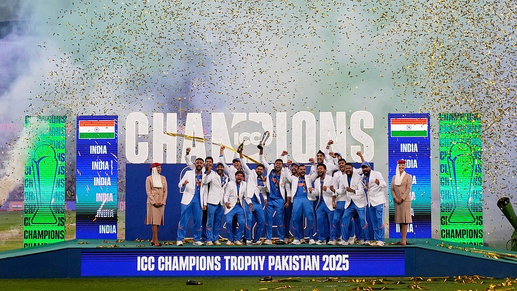 AP/Altaf Qadri : India's players celebrate after winning the ICC Champions Trophy final cricket match against New Zealand at Dubai International Cricket Stadium in Dubai, United Arab Emirates, Sunday, March 9, 2025.