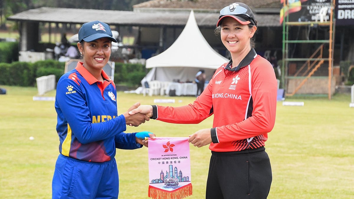 X/CricketNep : Captains Indu Barma (left) and Natasha Miles at the toss for the Nepal vs Hong Kong match.
