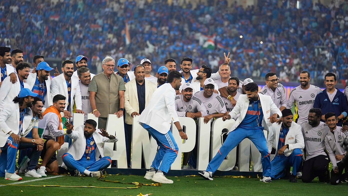 (AP Photo/Altaf Qadri) : Team India celebrates after winning the ICC Champions Trophy final cricket match against New Zealand at Dubai International Cricket Stadium in Dubai, United Arab Emirates, Sunday, March 9, 2025. 
