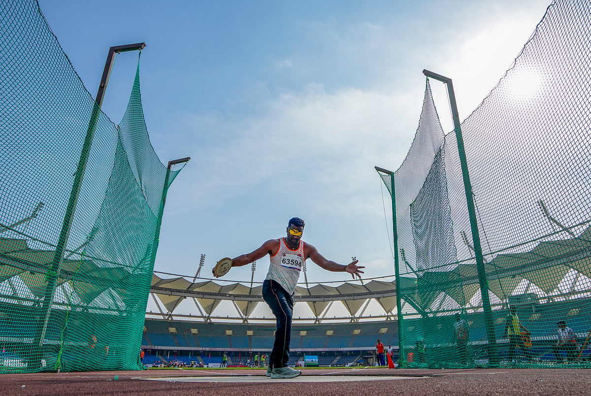 PTI/Ravi Choudhary : Para athlete Janak Singh Harsana competes in the men's discus throw F11 during the opening ceremony of the World Para Athletics Grand Prix 2025, in New Delhi, Tuesday, March 11, 2025.

