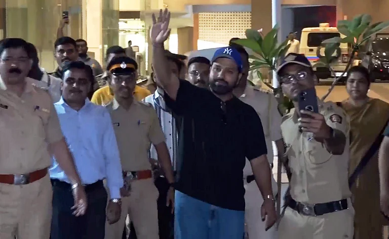 ndian cricket team skipper Rohit Sharma waves at fans on his arrival at his residence, in Mumbai, Monday, March 10, 2025 - PTI-photo