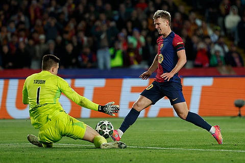 UCL 2024-25, FCB Vs Benfica: Benfica's goalkeeper Anatoliy Trubin, left, makes a save