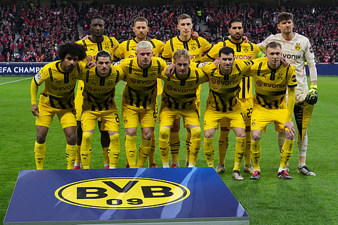 Borussia players pose before the Champions League round of 16 second leg soccer match between Lille and Borussia Dortmund in Villeneuve-d'Ascq , Wednesday, March 12, 2025. 
