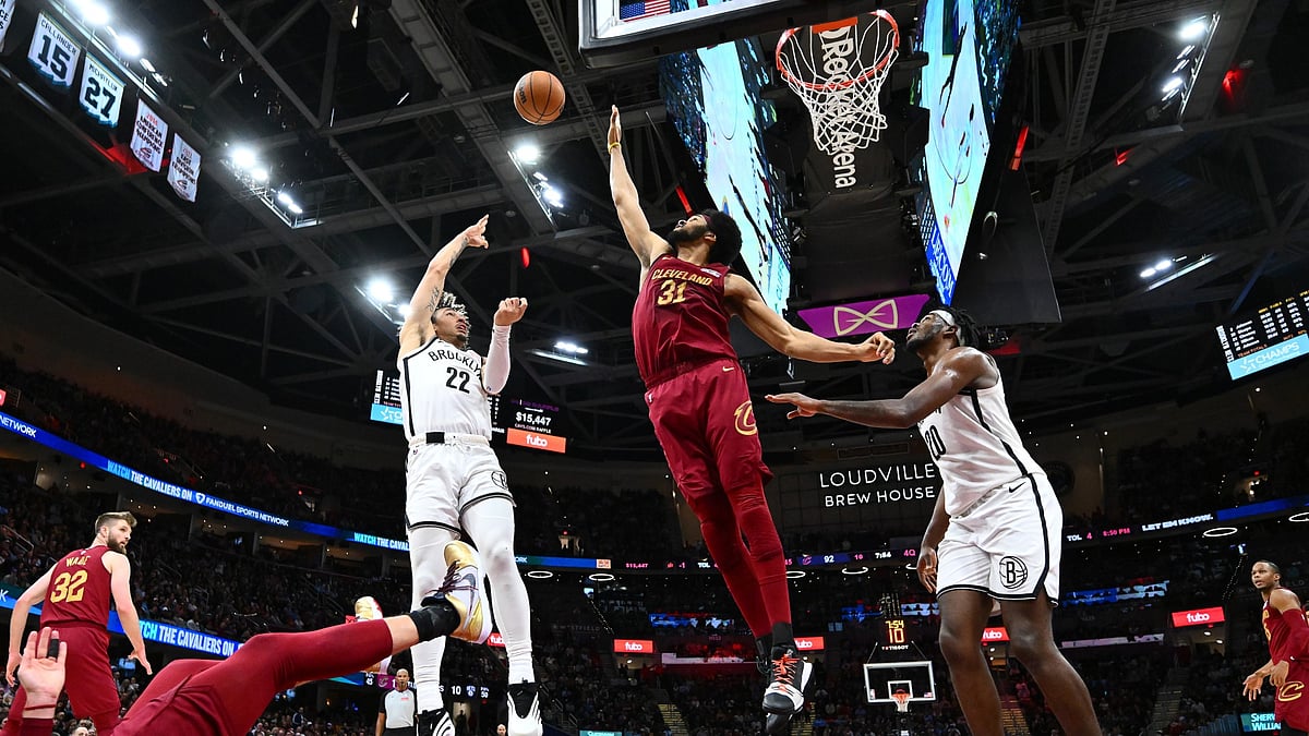 Jalen Wilson of the Brooklyn Nets shoots over Jarrett Allen of the Cleveland Cavaliers during the fourth quarter at Rocket Arena on March 11, 2025 in Cleveland, Ohio. The Cavaliers defeated the Nets 109-104.