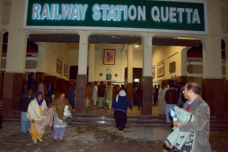 Passengers rescued by security forces from a passenger train attacked by insurgents arrive at a railway station in Quetta, - | Photo: AP