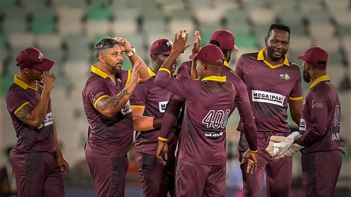 Photo: X | International Masters League : West Indies Masters team celebrating a wicket in the IML 2025.