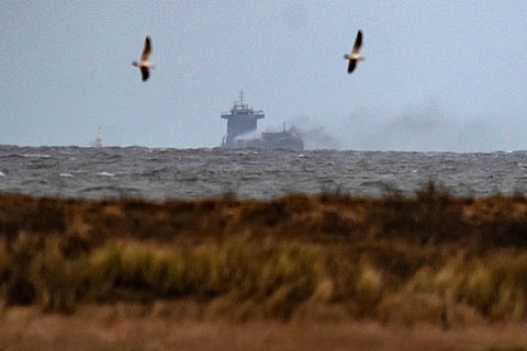 Britain Ships Collide: Smoke billows from the MV Solong cargo ship