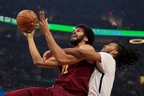 NBA 2024-25, Nets vs Cavaliers: Cavaliers center Jarrett Allen (31) is fouled by Nets forward Ziaire Williams