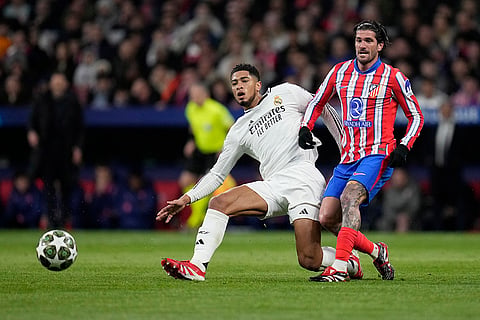 UCL 2024-25, Atletico Madrid and Real Madrid: Jude Bellingham and Atletico Madrid's Rodrigo De Paul fight for the ball