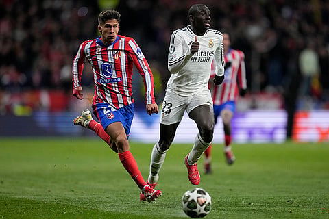 UCL 2024-25, Atletico Madrid and Real Madrid: Giuliano Simeone and Ferland Mendy rund for the ball 