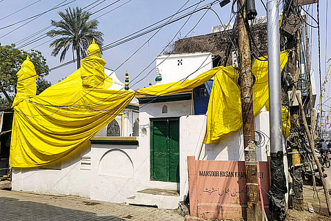 A mosque covered in tarpaulin in Shahjahanpur