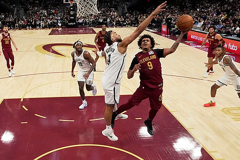 NBA 2024-25, Nets vs Cavaliers: Cleveland Cavaliers guard Craig Porter Jr. (9) shoots 