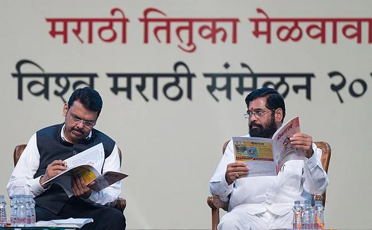 Eknath Shinde and Deputy Chief Minister Devendra Fadnavis during the All India Marathi Literary Conference 2023, at Worli, on January 4, 2023 in Mumbai, India. - Satish Bate/Hindustan Times via Getty Images