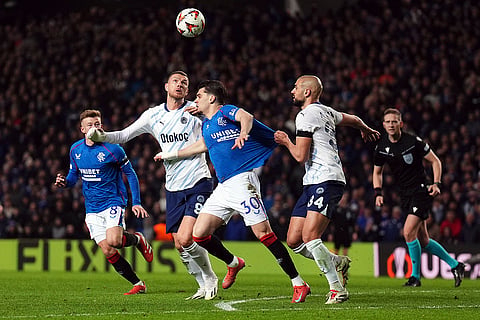 Europa League 2024-25: Rangers' Ianis Hagi and Fenerbahce's Sofyan Amrabat in action 