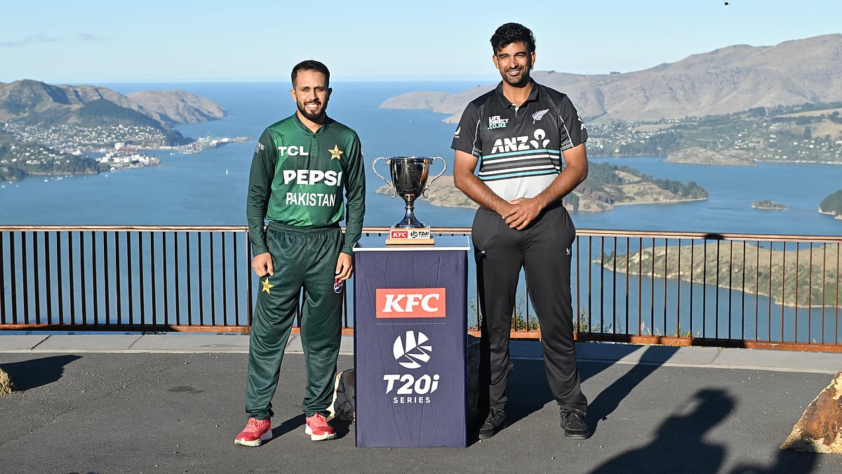 X/Pakistan Cricket : Ish Sodhi (right) and Mohammad Haris pose with the trophy ahead of the New Zealand vs Pakistan T20I series.