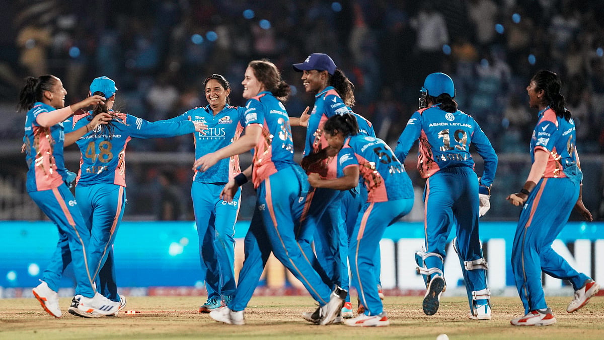 (PTI Photo/Kunal Patil) : Mumbai: Mumbai Indians celebrate their win against Delhi Capitals during the Women's Premier League (WPL) 2025 final cricket match between Delhi Capitals and Mumbai Indians at CCI in Mumbai, Saturday, March 15, 2025. 