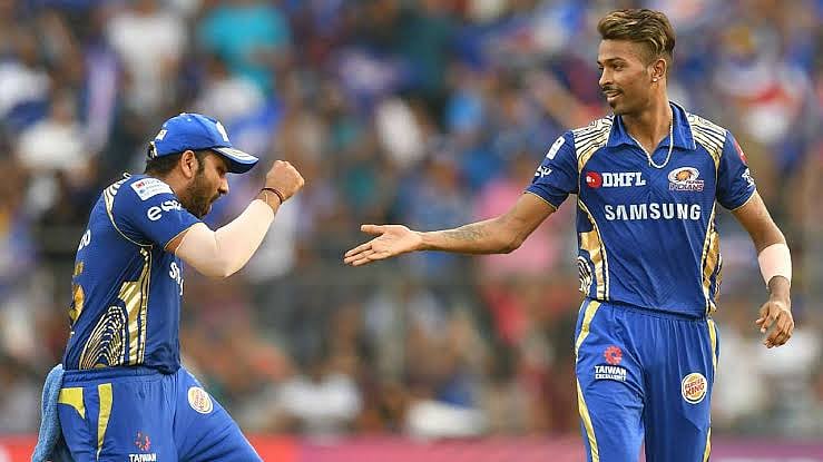 Mumbai Indians Captain Hardik Pandya (R) with Rohit Sharma celebrating a wicket in the IPL. - Photo: File