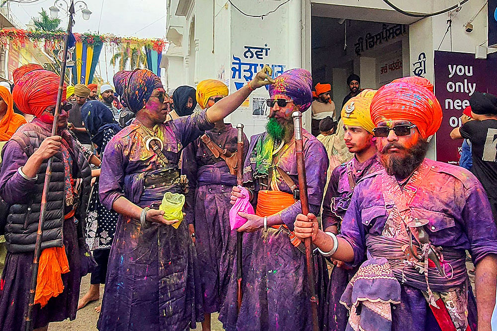 | Photo: PTI : Hola Mohalla festival