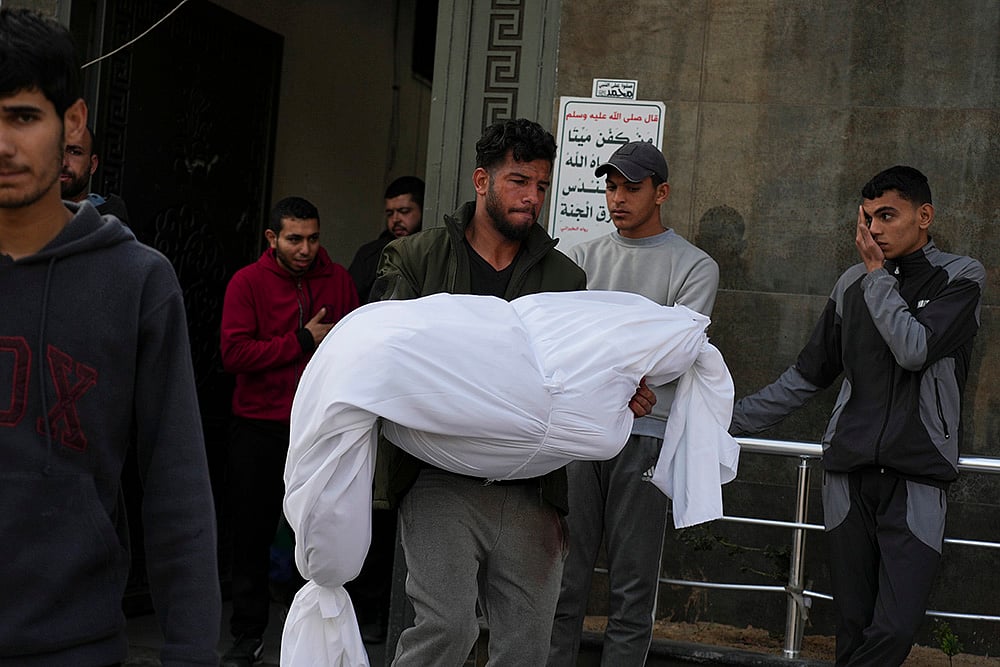 | Photo: AP/Abdel Kareem Hana : Israeli strikes across Gaza