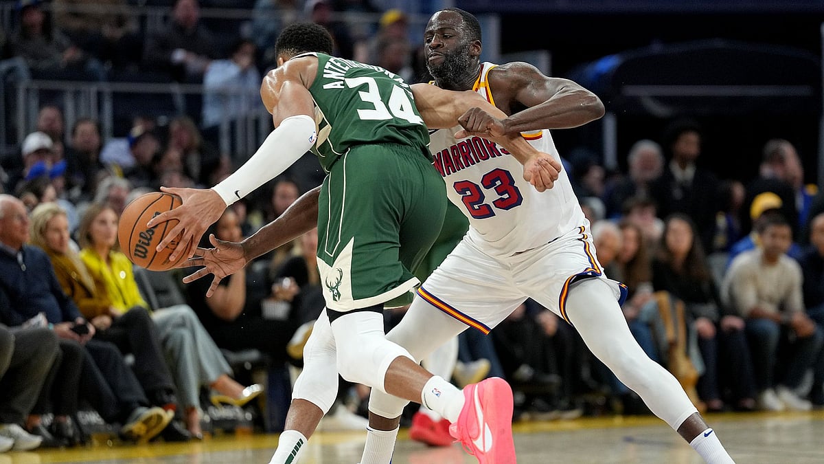 Green (right) kept Antetokounmpo largely quiet on Tuesday