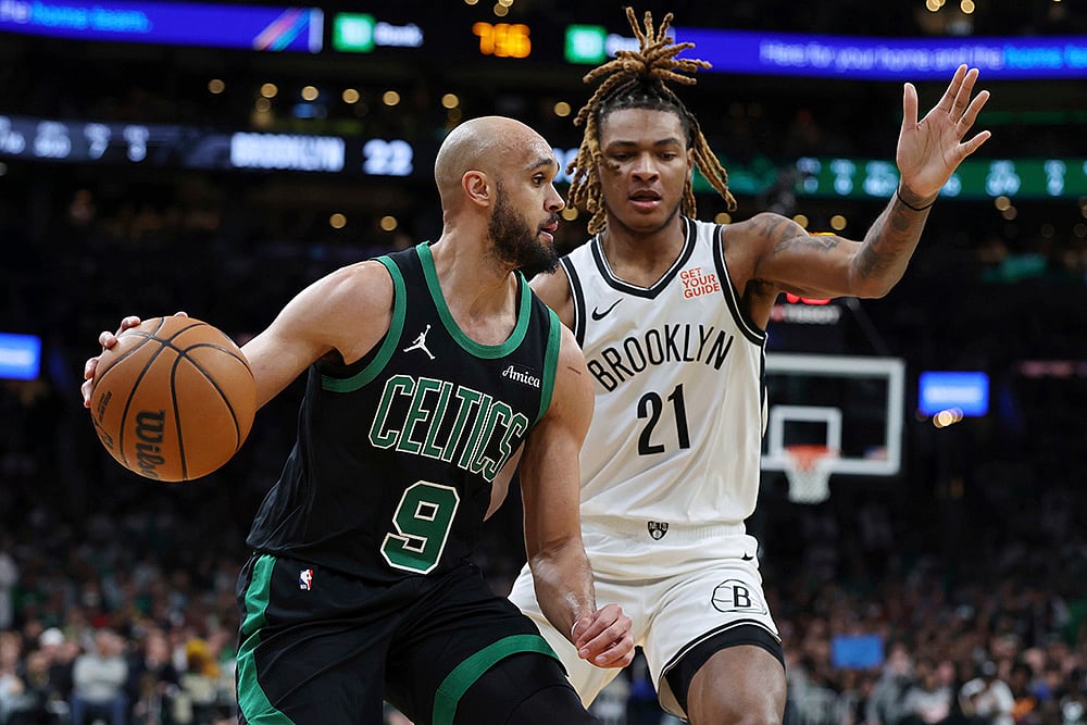 Boston Celtics vs Brooklyn Nets NBA basketball game in Boston photos: Derrick White