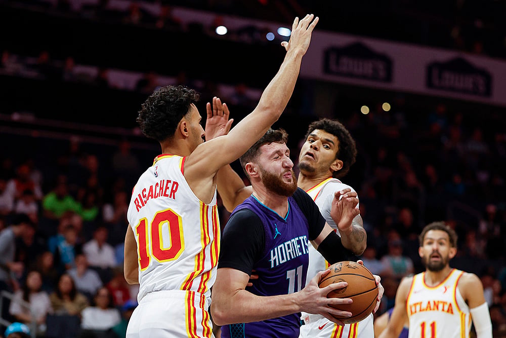Atlanta Hawks vs Charlotte Hornets NBA basketball game in Charlotte photos: Jusuf Nurkic