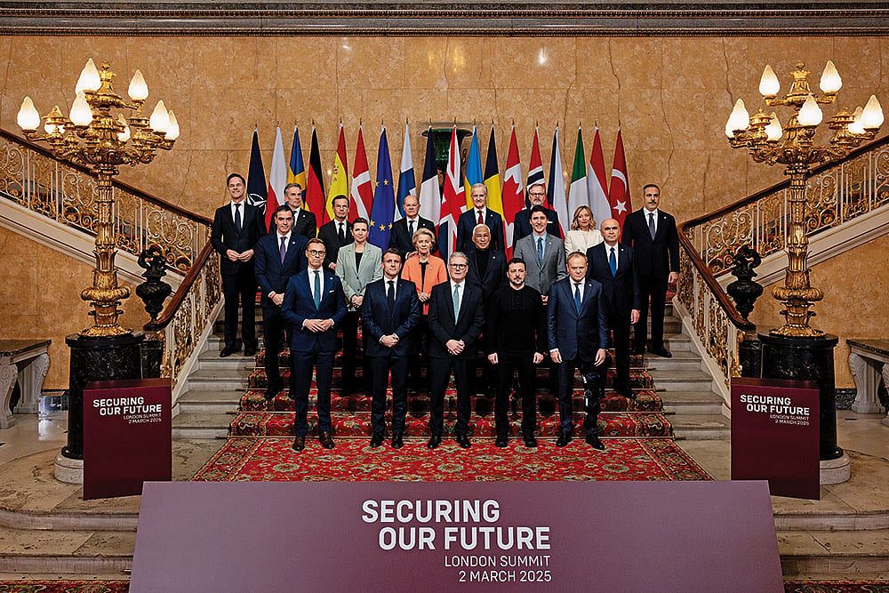 Photo: Getty Images : Trying to Stand: United British Prime Minister Keir Starmer (front row, centre) with leaders at the 
European Leaders Summit in London on March 2, 2025