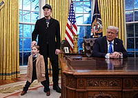 Beauty In The White House Andrew Harnik/Getty Images : Tesla and SpaceX CEO Elon Musk, joined by his son X, delivers remarks alongside U.S. President Donald Trump during an executive order signing in the Oval Office at the White House on February 11, 2025 in Washington, DC. Trump is to sign an executive order implementing the Department of Government Efficiency’s (DOGE) "workforce optimization initiative," which, according to Trump, will encourage agencies to limit hiring and reduce the size of the federal government.