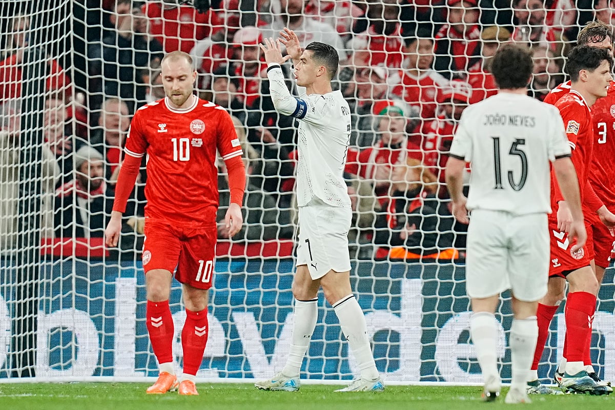 Portugal's Cristiano Ronaldo, second from left, reacts during the UEFA Nations League playoff match, League A, between Denmark and Portugal, at Parken in Copenhagen, Denmark, Thursday, March 20, 2024. 
 - (Liselotte Sabroe/Scanpix 2025/Ritzau Scanpix via AP)

