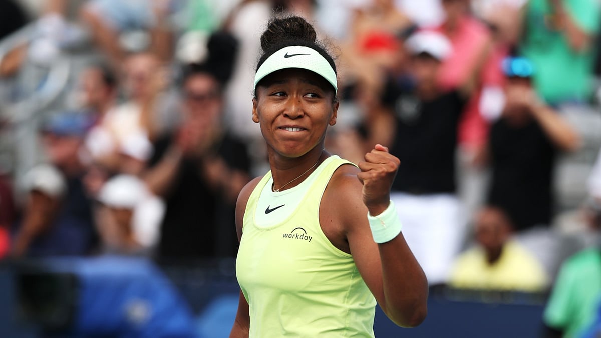Naomi Osaka celebrates her victory over Hailey Baptiste at Miami Open 2025. 