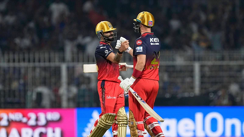 Royal Challengers Bengalurus Virat Kohli, left, and Liam Livingstone. AP