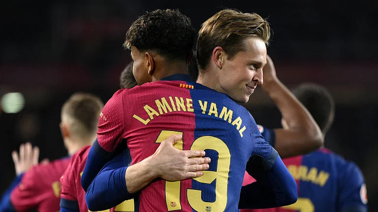 Frenkie de Jong and Lamine Yamal. - null