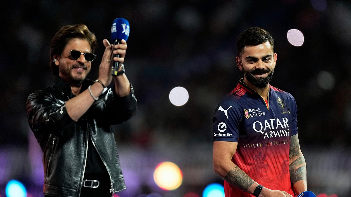 Photo: X | AP Photo/Bikas Das : Bollywood actor Shah Rukh Khan, left, claps as Royal Challengers Bengaluru's Virat Kohli reacts before the opening Indian Premier League cricket match between Kolkata Knight Riders and Royal Challengers Bengaluru at the Eden Gardens in Kolkata.