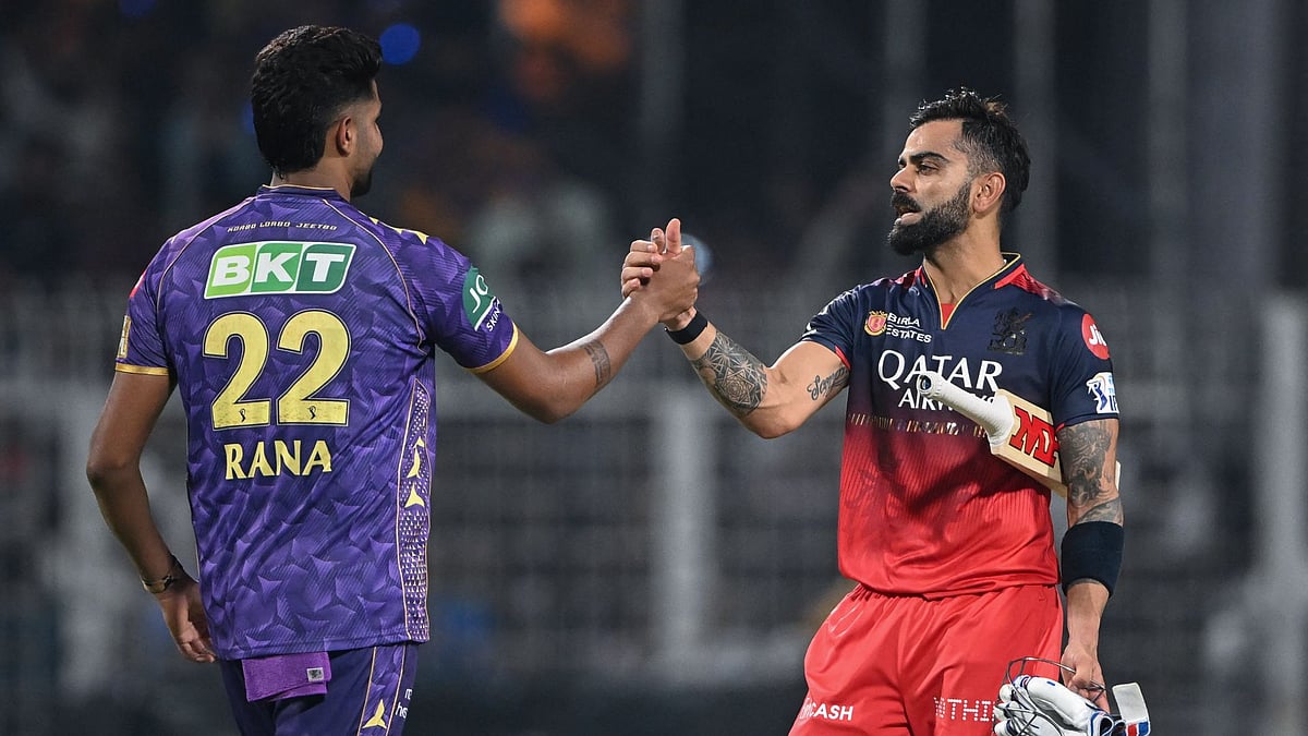 Kohli (right) shakes hands with Rana following the matchs conclusion