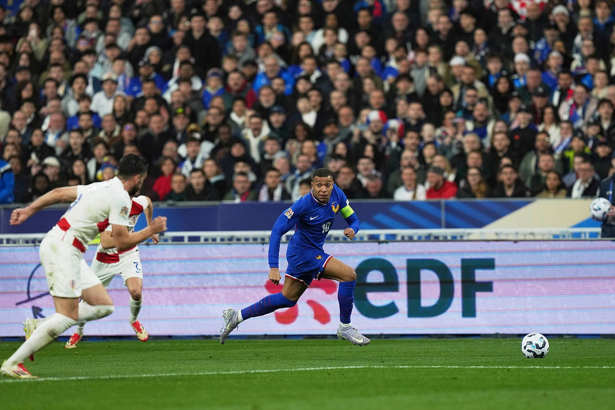 France's Kylian Mbappe, center, runs for the ball during the UEFA Nations League quarterfinal second leg soccer match between France and Croatia, at the Stade de France in Saint-Denis, outside Paris, Sunday, March 23, 2025.

