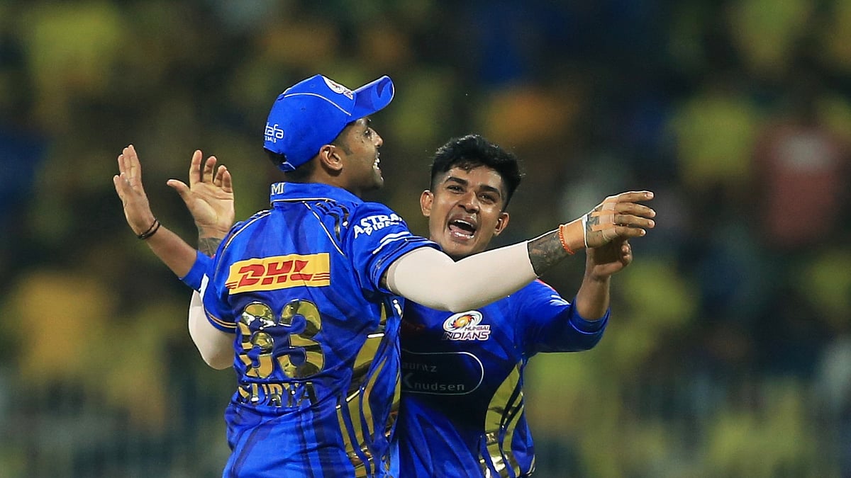 Mumbai Indians Vignesh Puthur, right, and SKY celebrate. AP