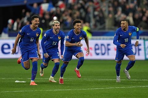 France players celebrate after winning the penalty shootout during the UEFA Nations League quarterfinal second leg soccer match between France and Croatia, at the Stade de France in Saint-Denis, outside Paris, Sunday, March 23, 2025. 

