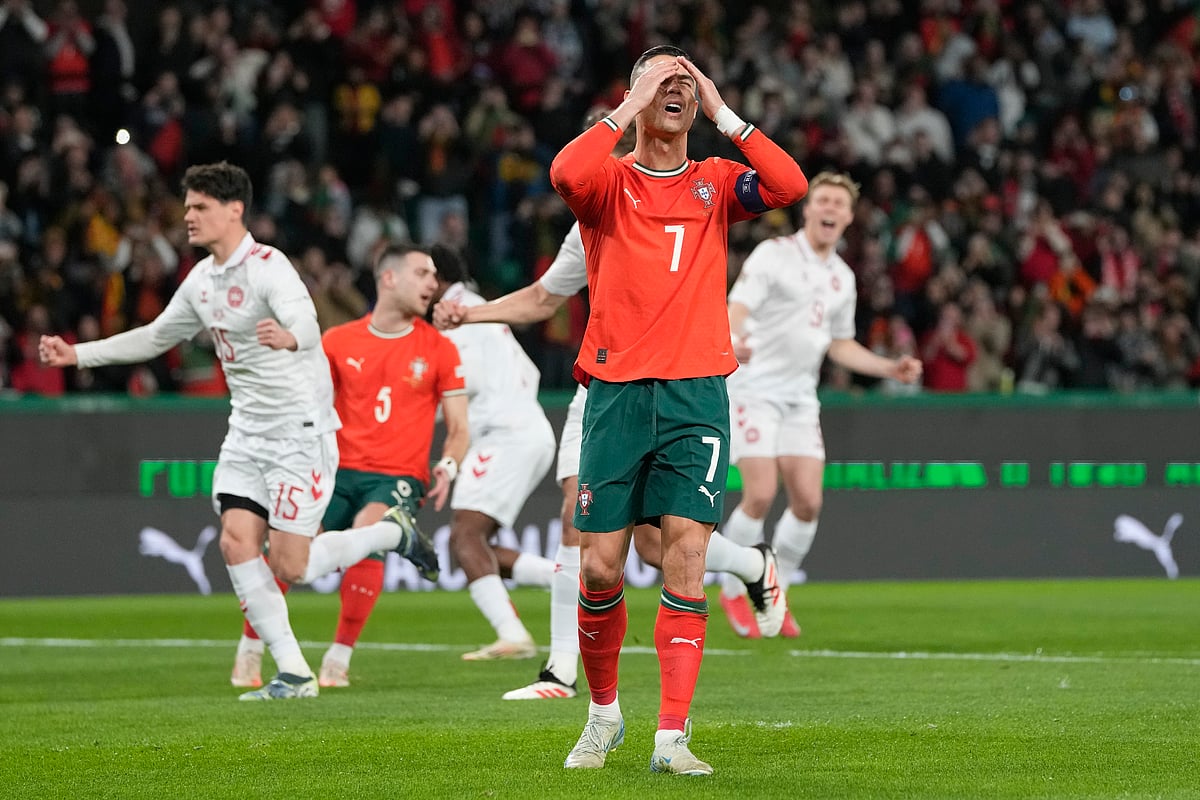Portugal's Cristiano Ronaldo reacts after he fails to score with a penalty during the UEFA Nations League soccer match between Portugal and Denmark, at the Jose Alvalade Stadium in Lisbon, Sunday, March 23, 2025.
