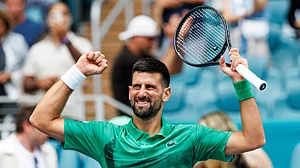 Novak Djokovic celebrates his win over Camilo Ugo Carabelli at the Miami Open
