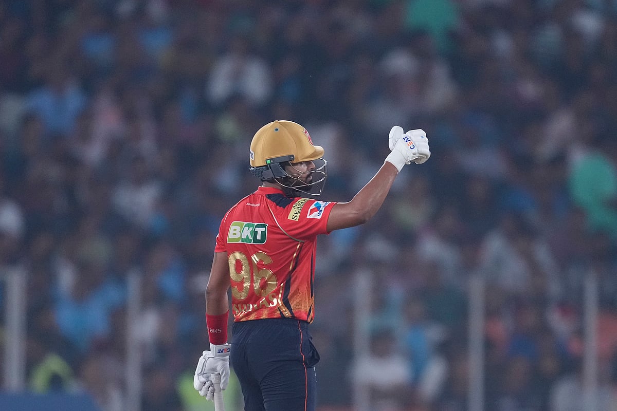 Punjab Kings' captain Shreyas Iyer celebrates after scoring fifty runs during the Indian Premier League cricket match between Gujarat Titans and Punjab Kings at Narendra Modi Stadium in Ahmedabad, India, Tuesday, March 25, 2025. 
 - (AP Photo/Ajit Solanki)

