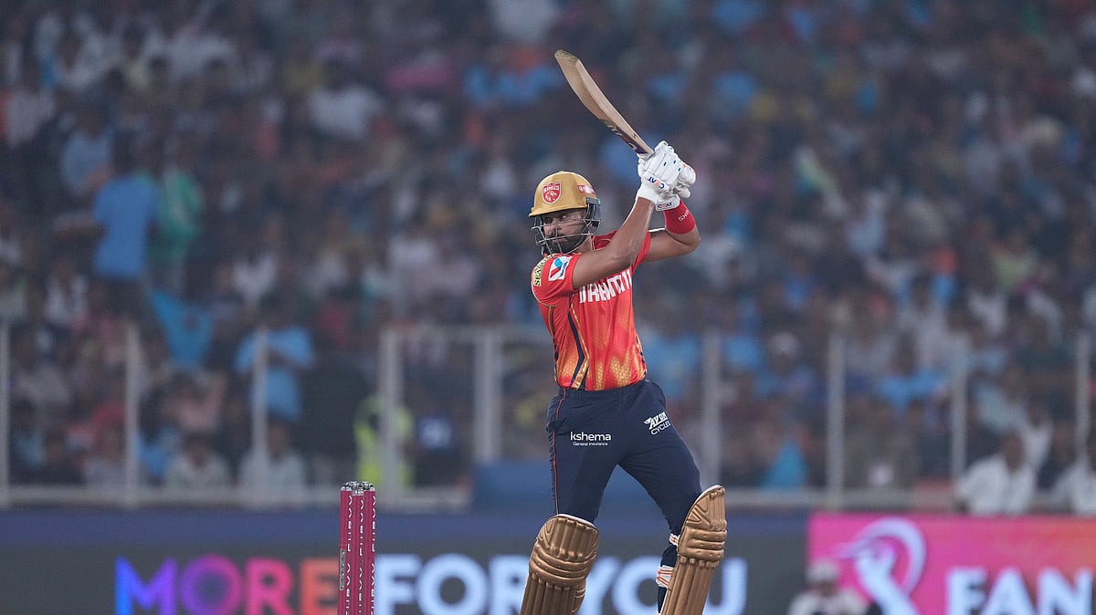 Punjab Kings' captain Shreyas Iyer plays a shot during the Indian Premier League cricket match between Gujarat Titans and Punjab Kings at Narendra Modi Stadium in Ahmedabad. - AP Photo/Ajit Solanki