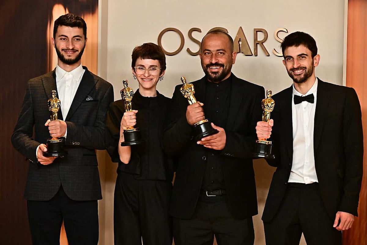 From left: Yuval Abraham, Rachel Szor, Hamdan Ballal and Basel Adra  - Photo by Frederic J. Brown/AFP via Getty Image