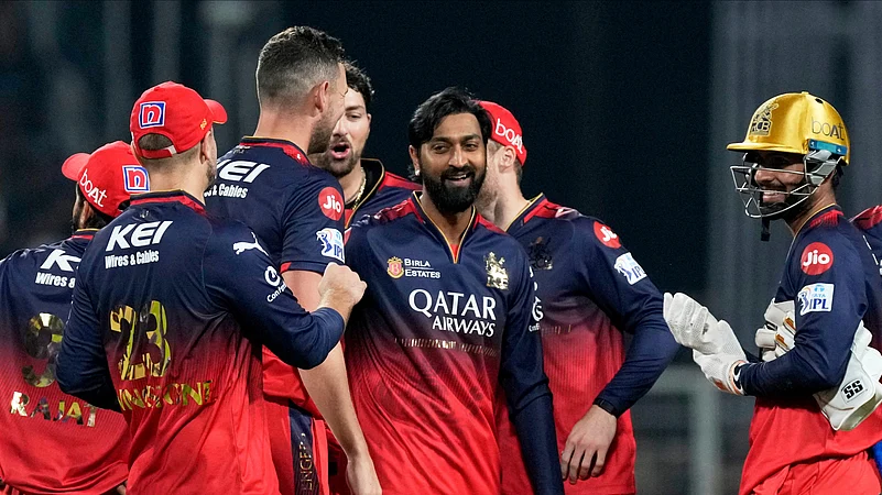 Royal Challengers Bengalurus Krunal Pandya, center, celebrates. AP