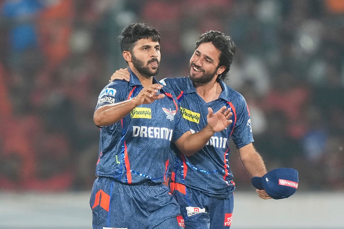 Lucknow Super Giants Shardul Thakur, left, and Ravi Bishnoi celebrates the dismissal of Sunrisers Hyderabad's Abhishek Sharma during the Indian Premier League cricket match between Sunrisers Hyderabad and Lucknow Super Giants at Rajiv Gandhi International Cricket Stadium in Hyderabad, India, Thursday, March 27, 2025.
 -  (AP Photo/Mahesh Kumar A.)

