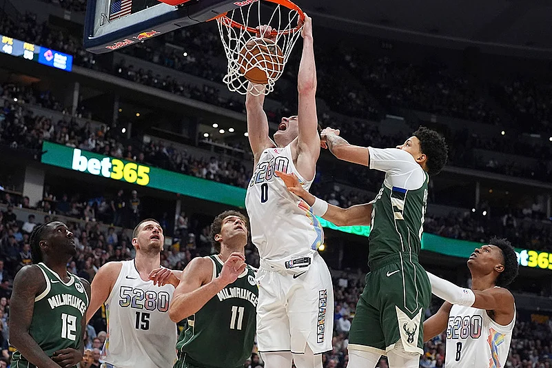 NBA basketball 2024-25 Milwaukee Bucks vs Denver Nuggets: Christian Braun
