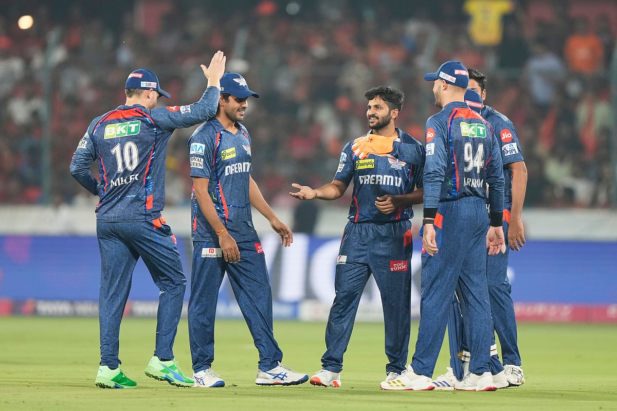 Lucknow Super Giants Shardul Thakur, center, celebrates with teammates after the dismissal of Sunrisers Hyderabad's Ishan Kishan during the Indian Premier League cricket match between Sunrisers Hyderabad and Lucknow Super Giants at Rajiv Gandhi International Cricket Stadium in Hyderabad, India, Thursday, March 27, 2025. 

 - (AP Photo/Mahesh Kumar A.)
