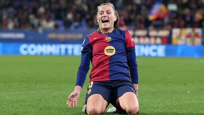 Claudia Pina celebrates after scoring Barcelonas fifth goal