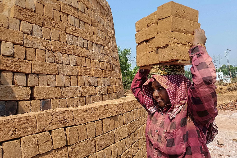 Representative Image: Woman at brick kiln - Photo: PTI